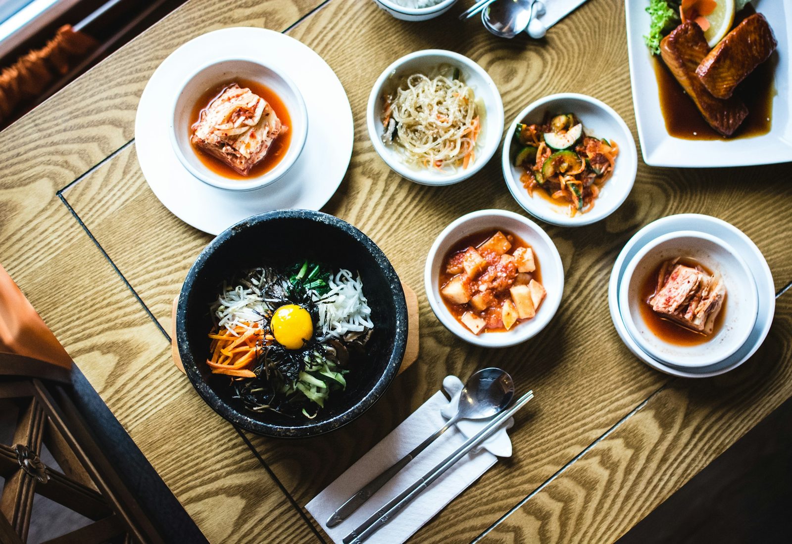 Korean banchan side dishes and stone-pot rice